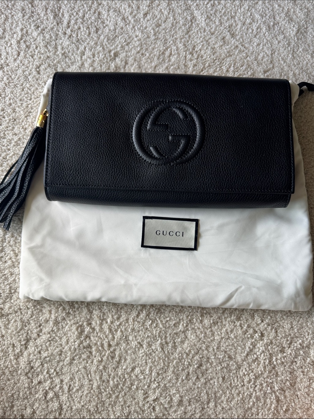 Gucci Soho Black Leather Tassel Clutch with Embossed GG